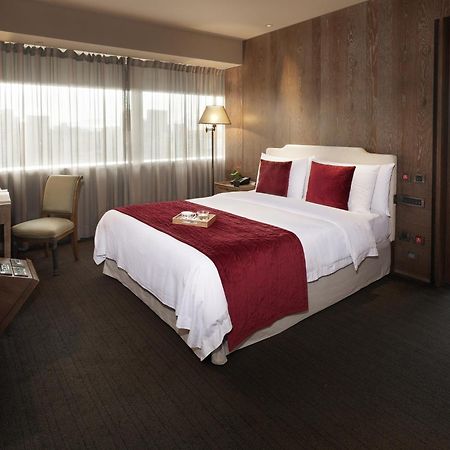 Palais De Chine Hotel Tajpej Zewnętrze zdjęcie A bedroom at the hotel