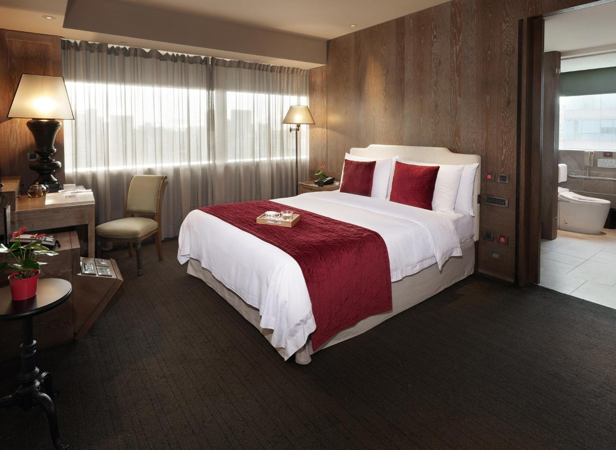 Palais De Chine Hotel Tajpej Zewnętrze zdjęcie A bedroom at the hotel